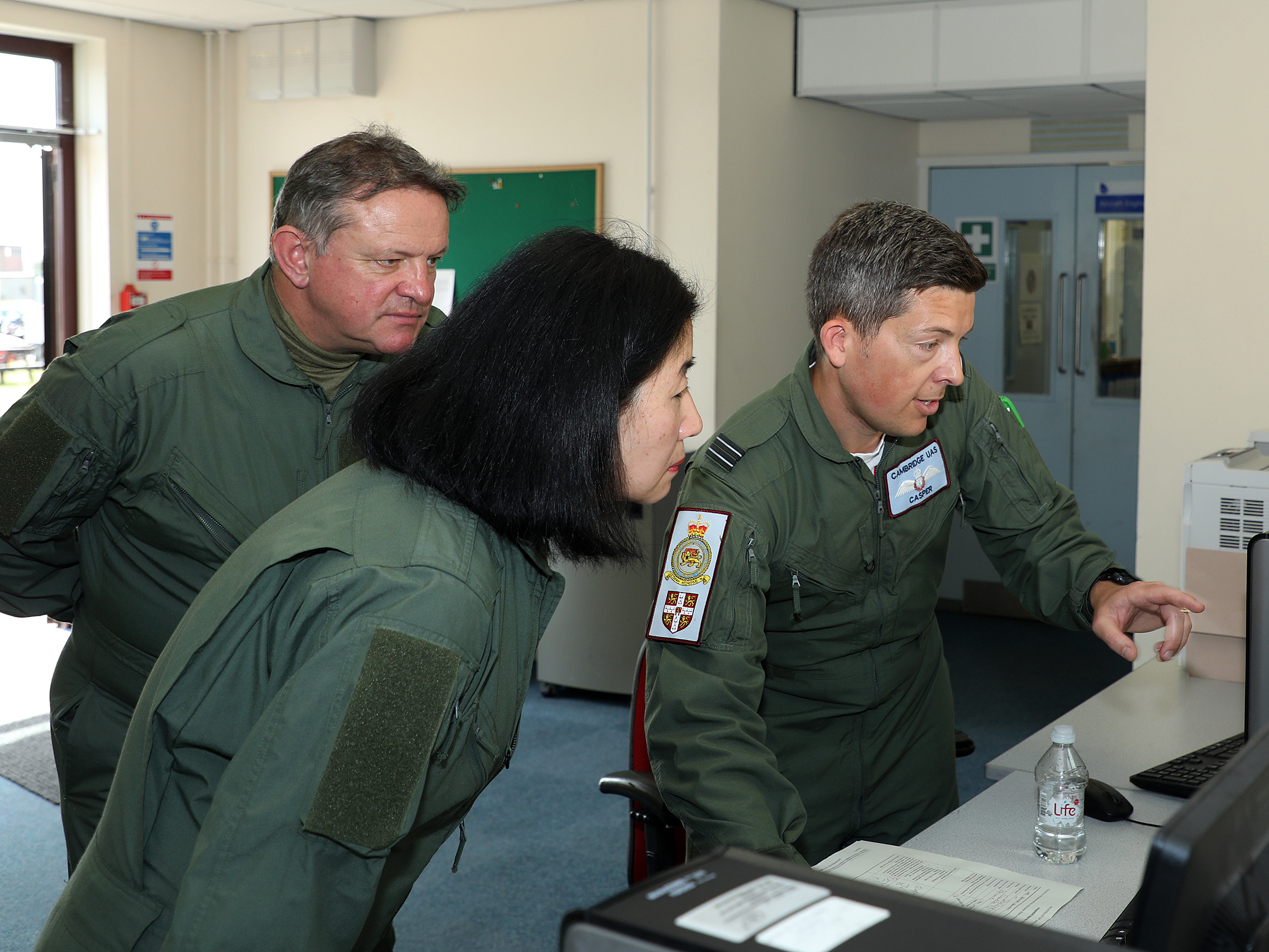 From left to right: Mr. John Crompton, Mrs Jennifer Crompton and Flying Instructor Flight Lieutenant Casper MacCormack
